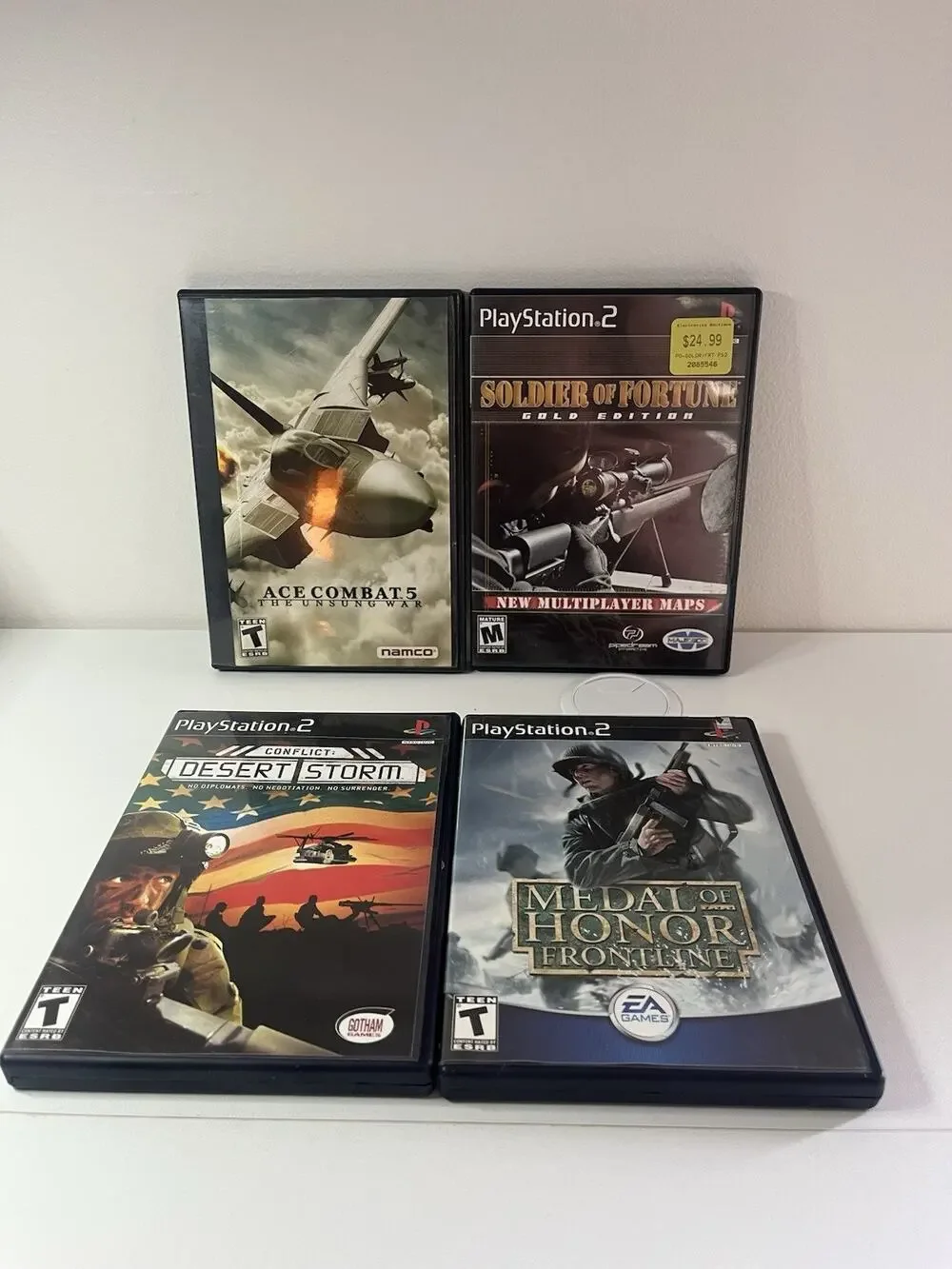 PlayStation 2 Lot Of 4 PS2 Shooter Games Medal of Honor Soldier Ace Combat Storm